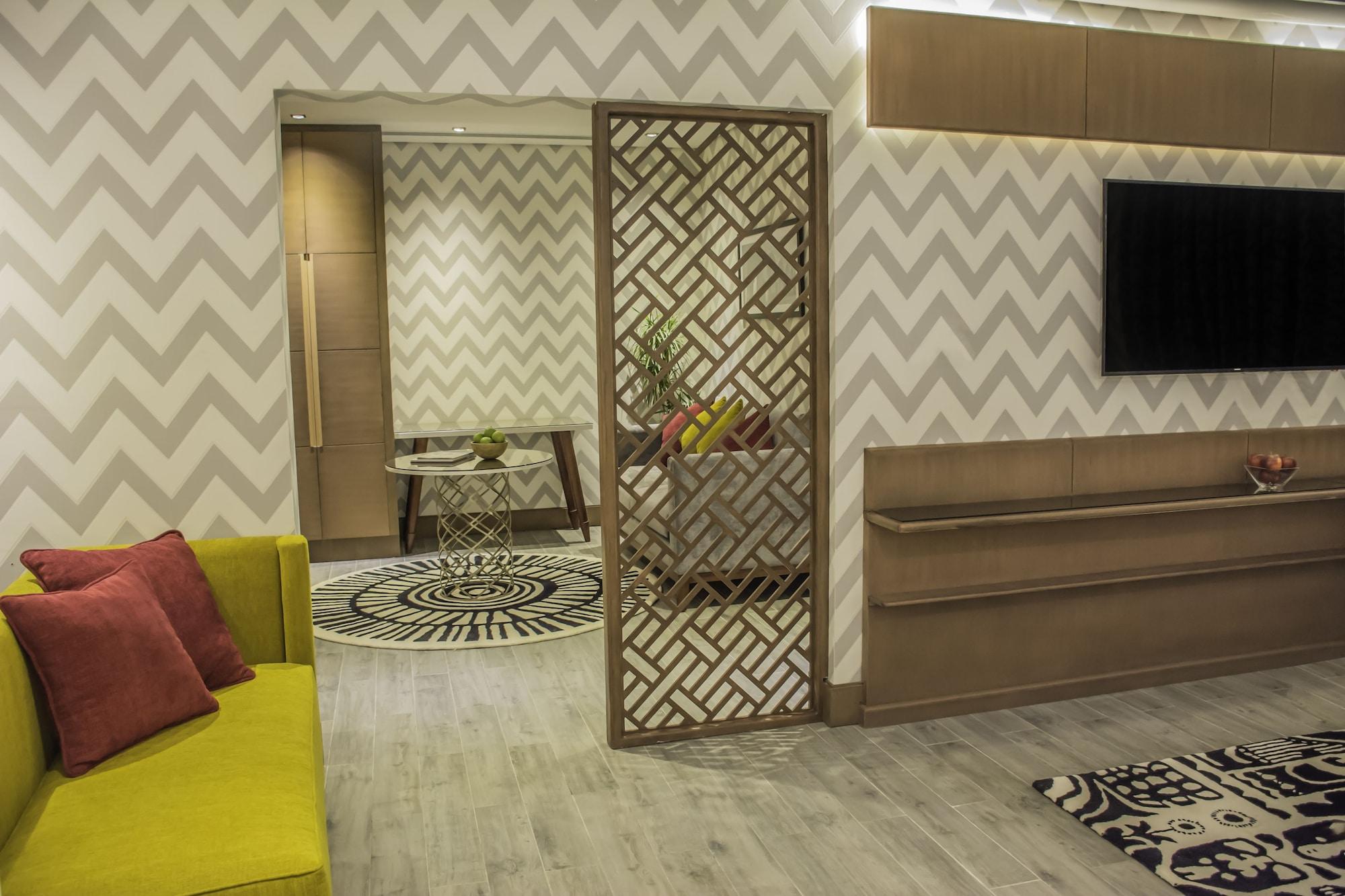 Radisson Blu Resort, Al Khobar Half Moon Bay Esterno foto A room divider in a living room